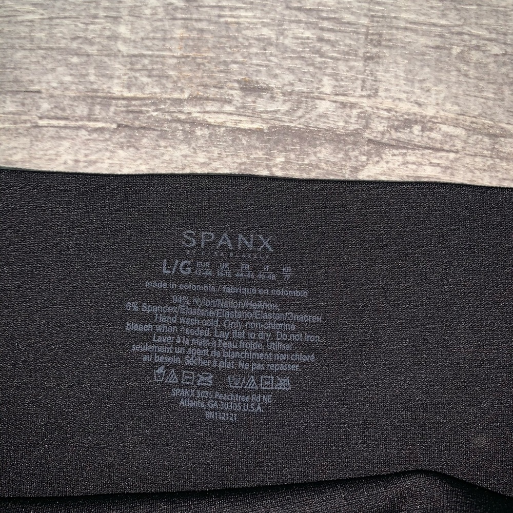 Spanx black leggings size large